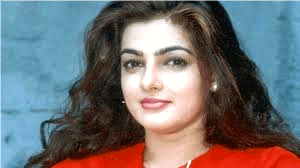 Mamta Kulkarni, a former Bollywood actress known for her glamorous roles in the 90s, rose to fame with hits like Baazigar and Karan Arjun, before disappearing from the limelight amid controversies.